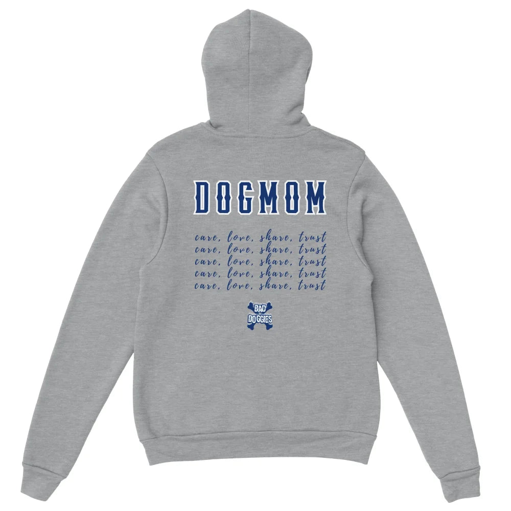 Sweat Ă capuche gris avec texte âDOGMOMâ et motifs de pattes dans le dos.