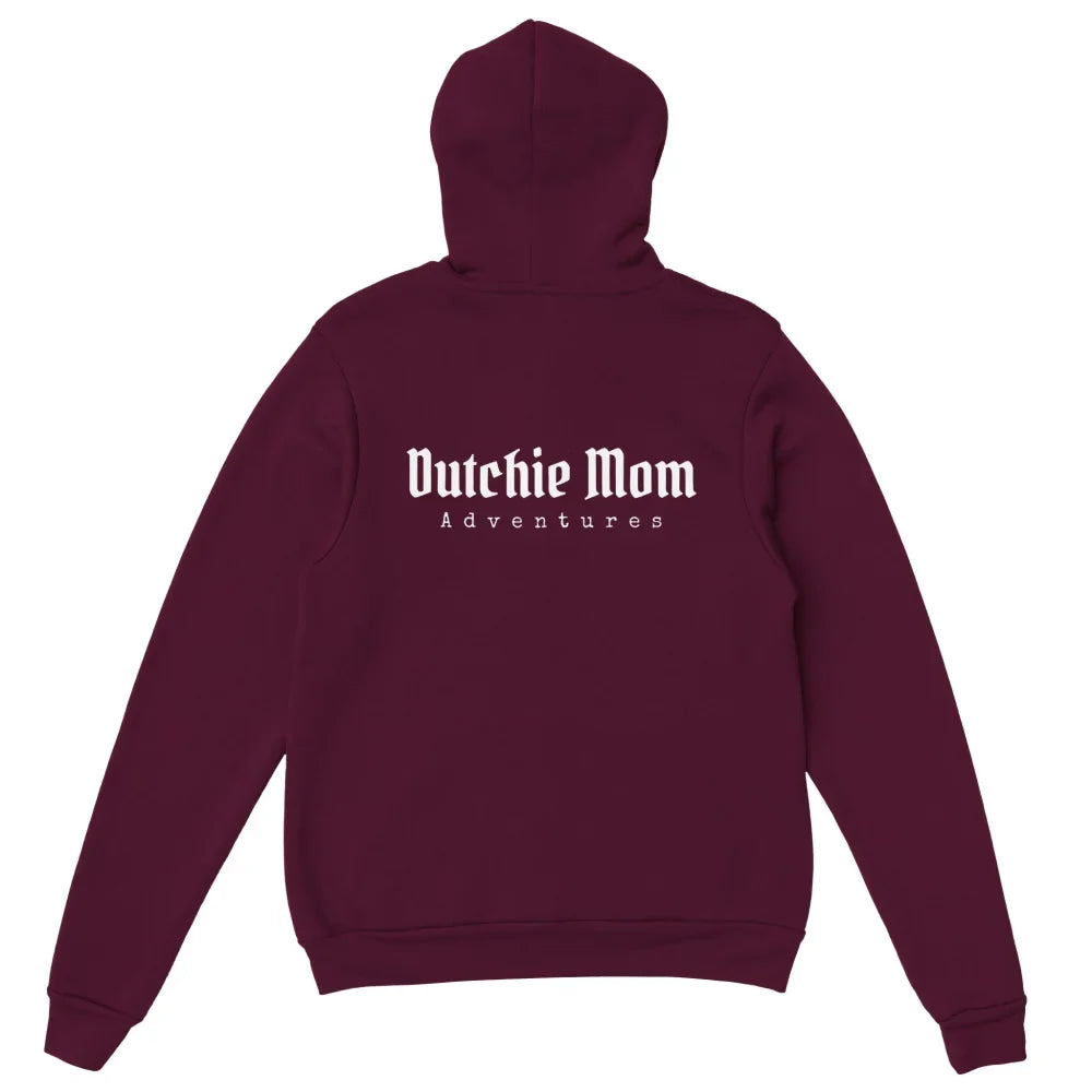 Sweat à capuche marron avec texte ’Dutchie Mom’ imprimé dans le dos.